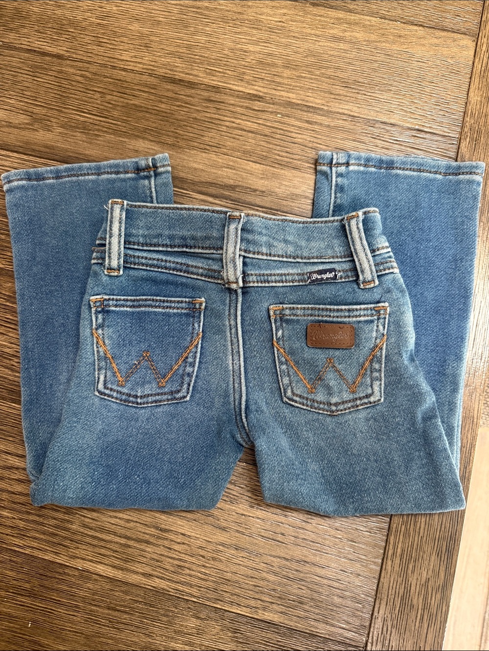 Wrangler Women's Light Blue Boot Cut Jeans with Signature Pocket Stitching